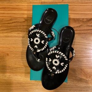 Beautiful black and white sandals! Water proof! Still a good condition!